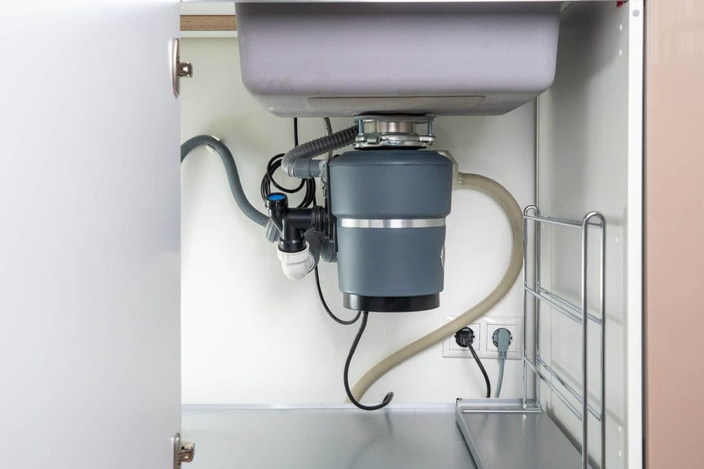 How to Unclog a Garbage Disposal (7 Quick & Easy Steps)