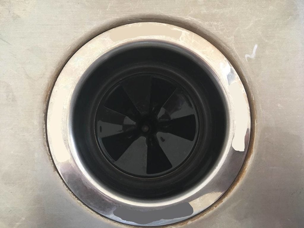 How to Unclog a Garbage Disposal (7 Quick & Easy Steps)